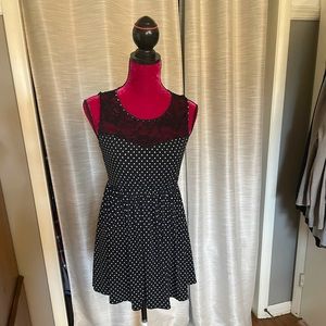 Cute polkadot dress with lace straps.